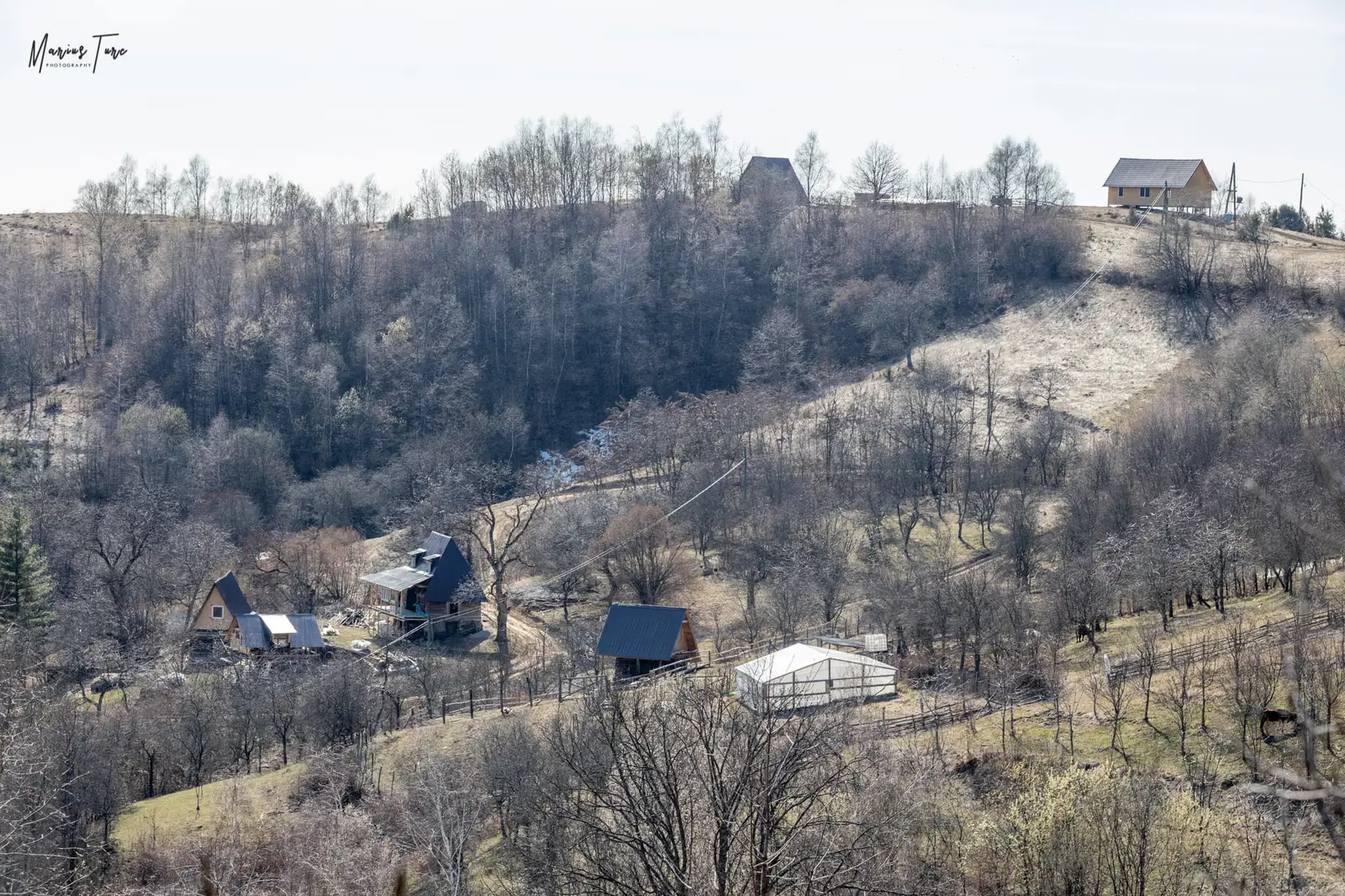  Biserica in deal si casele celor veniti mai la vale - Marius Turc